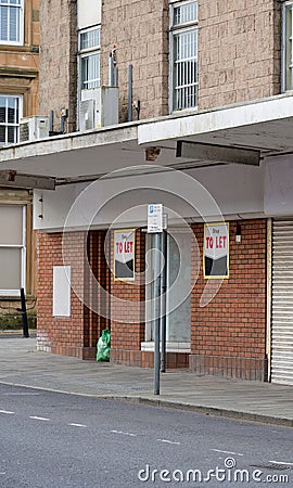 Port Glasgow, UK, April 22nd 2023, Shop to let sign due to closed business Editorial Stock Photo