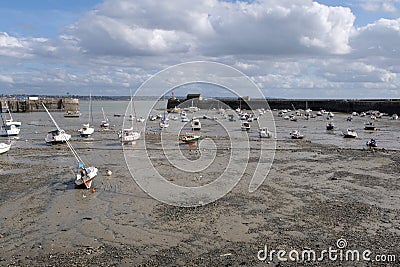 Port of Granville at low tide in Normandy Stock Photo