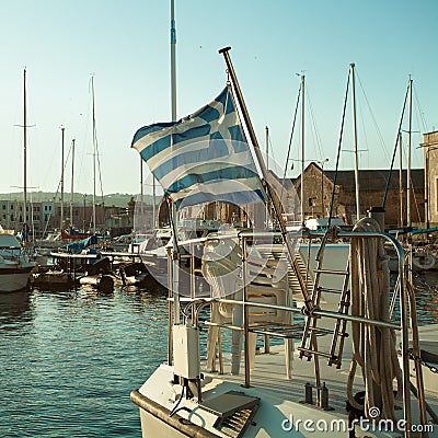 Port, the Greek flag and boats, impressions of Greece Stock Photo