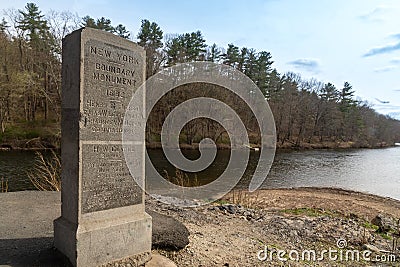 Port Jervis, NY - USA - April 10,2021: View of Witness Monument or the western State Line Monument, is a tall upright granite Editorial Stock Photo