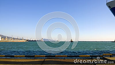 Port landscape. View of the industrial port. The sea, port crane Stock Photo