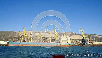 Port landscape. View of the industrial port. The sea, port crane Stock Photo