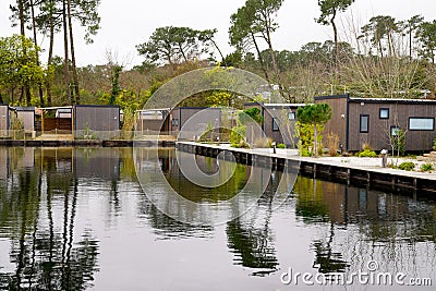 Port Maguide wooden house village in lake Biscarrosse Stock Photo