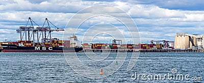 Port activity and cargo shipping business in Montreal Editorial Stock Photo