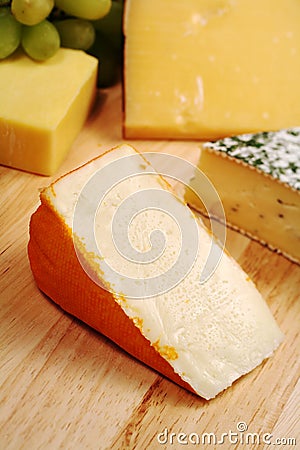 Port Salut cheeseboard Stock Photo