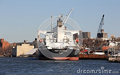 PORT SHANGHAI bulk carrier moored in Kill Van Kull on Staten Island side, stern view Editorial Stock Photo
