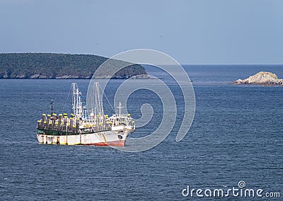 Korean fishing ship equipped for attracting squid in Stanley Editorial Stock Photo