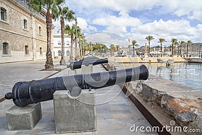 Port view,promenade and old cannons in Cartagena,Spain. Editorial Stock Photo