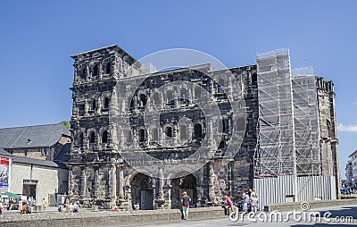 Porta nigra in Trier, Germany with visitors Editorial Stock Photo