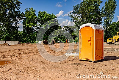 Porta Potty on a construction site. Stock Photo