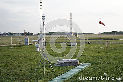 A portable automatic weather station is located in the large meteorological garden. This tool is used to retrieve meteorological Editorial Stock Photo