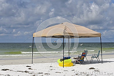 Portable Beach Shelter and Chairs Stock Photo