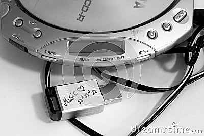 Portable Cd player and a flash drive with music files Stock Photo