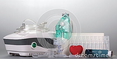 Portable and Compressor inhaler whis mask, dosage medication Stock Photo