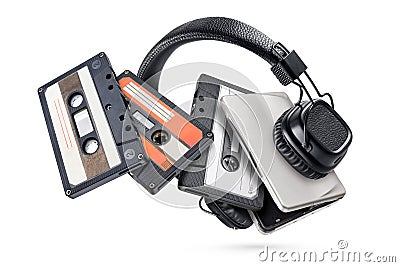 Portable player with headphones and tapes isolated on white Stock Photo