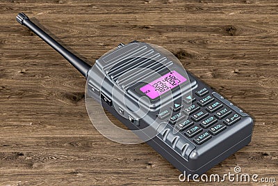 Portable radio walkie-talkie on the wooden table, 3D rendering Stock Photo