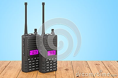 Portable radios walkie-talkie on the wooden planks, 3D rendering Stock Photo