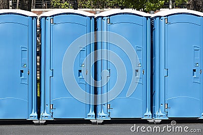 Portable wc. Public mobile toilet set in the street. Transportable Stock Photo