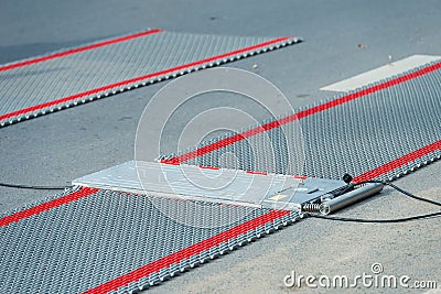 Portable wheel load scales for determining the weight of heavy vehicles. Editorial Stock Photo