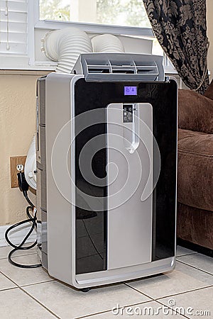 Portable Window Air Conditioner Unit Stock Photo