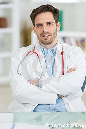 Portait young male doctor with stethoscope Stock Photo