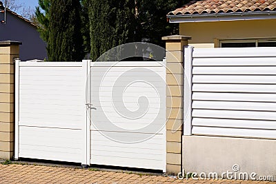 Portal white metal aluminum house double gate and slats Stock Photo