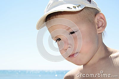 Portarit of boy on summer sea beach Stock Photo
