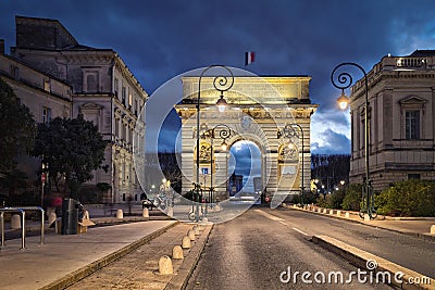 Triumphal arch at dusk in Montpellier, France Stock Photo