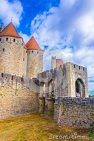 Porte Narbonnaise leading to the old town of Carcassonne, France Editorial Stock Photo