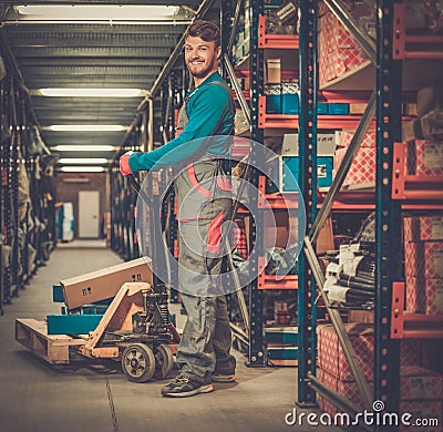 Porter carrying boxes Stock Photo