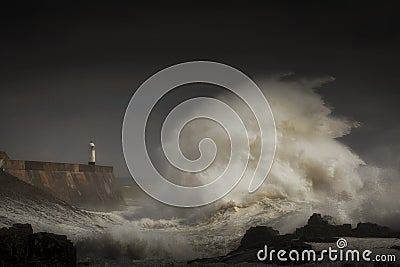 Porthcawl lighthouse and storm Stock Photo