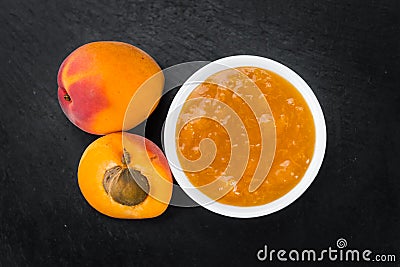 Portion of Apricot Jam on a slate slab Stock Photo