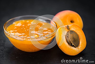 Portion of Apricot Jam on a slate slab Stock Photo