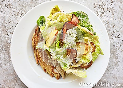 Portion of cesar salad with chicken Stock Photo