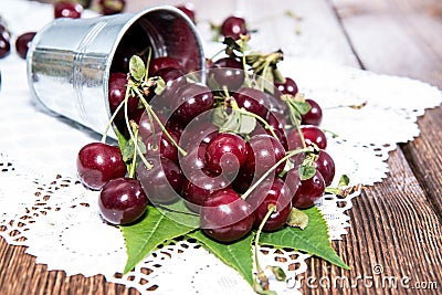 Portion of Cherries on wood Stock Photo