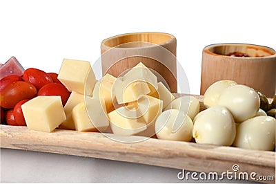 portion of cold snacks cheese ham olive oil Stock Photo