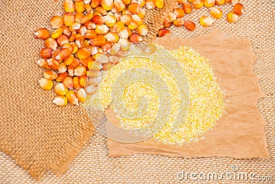 Portion of Cornmeal on rustic background Stock Photo