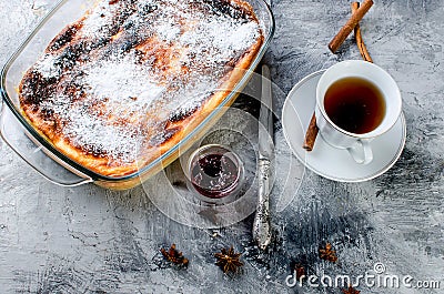 Cottage cheese casserole . Pie with cheese and cup of tea Stock Photo