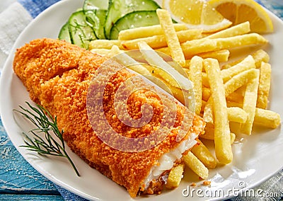 Portion of crispy fish with chips Stock Photo