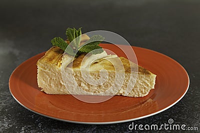 Portion delicious cheesecake in a red plate Stock Photo