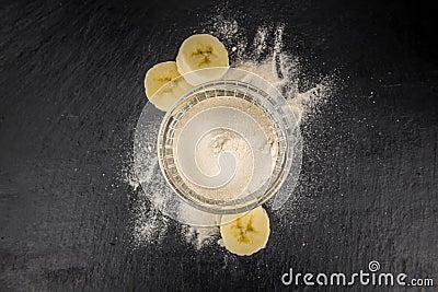 Portion of Ground Banana on a slate slab Stock Photo