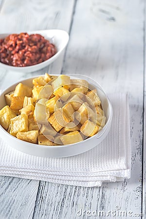 Portion of patatas bravas with sauces Stock Photo