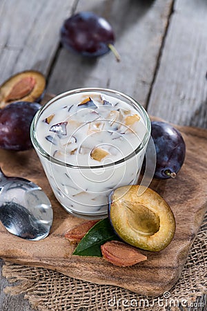 Portion of Plum Yoghurt Stock Photo