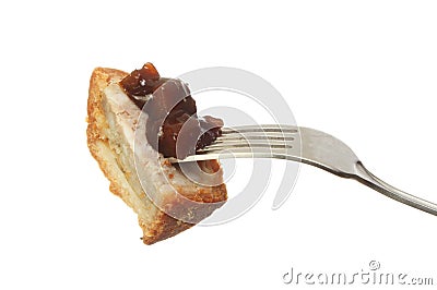 Pork pie and pickle on a fork Stock Photo