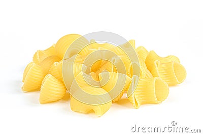 Portion of uncooked pasta snails isolated on white background. Dry Italian rigate dish Stock Photo