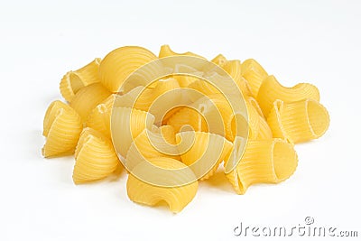 Portion of uncooked pasta snails isolated on white background. Dry Italian rigate dish Stock Photo