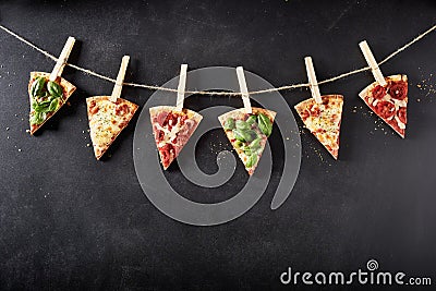 Portions of Italian pizzas with different toppings Stock Photo