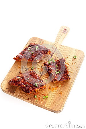 Portions of spicy BBQ ribs Stock Photo