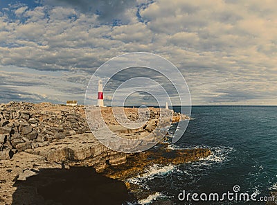 Portland Bill Lighthouse. Dorset coast in Isle of Portland, UK. A waymark guiding vessels navigating in the English Channel Stock Photo