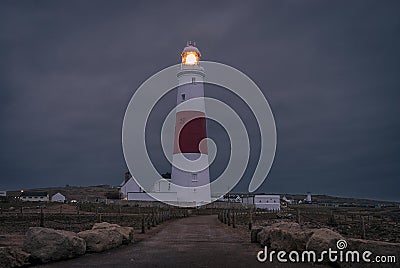 Portland Bill lighthouse on the south coast of England in Dorset shines out Stock Photo